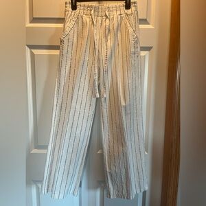 Casual black and white striped pants.